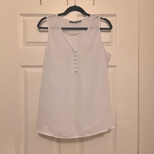White sleeveless top